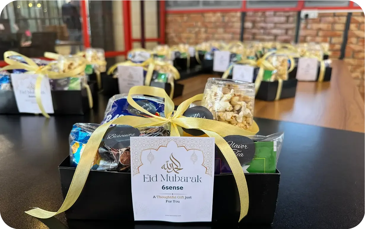 6sense HQ teammates with their Eid gift boxes